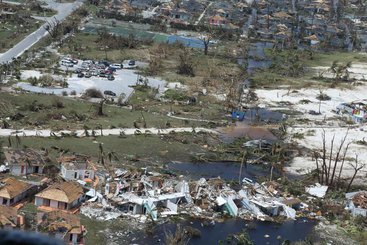 Hurricane affected houses in the Bahamas, 2019. Photo: Coast Guard News. CC BY-NC-ND 2.0.